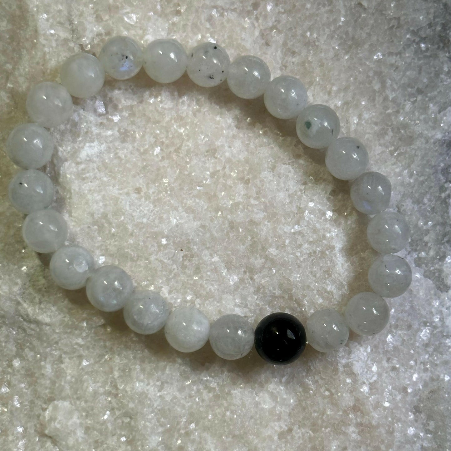 Rainbow Moonstone Bracelet with Black Tourmaline -the iridescence adds a multicolored dimension. Heals the   emotions. Black tourmaline strengthens the resolve and protects.
