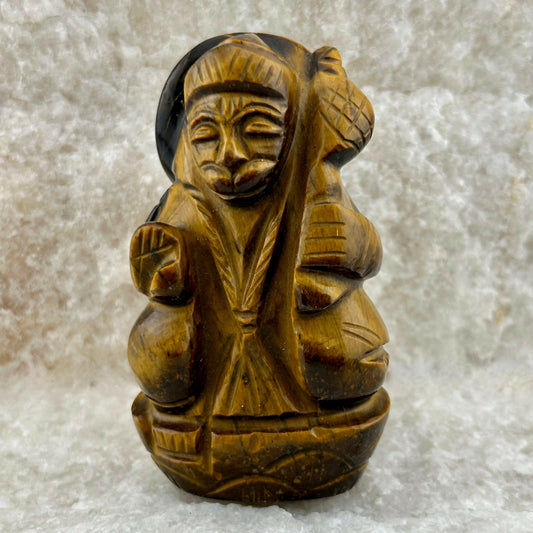 This beautifully hand carved Hanuman in Tiger Eye crystal gemstone radiates the power of the idol of protection, courage and limitless confidence.
